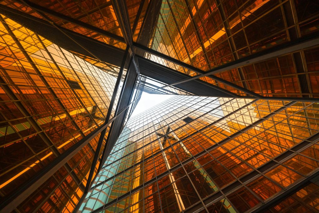 Office buildings windows. Glass architecture facade design with reflection